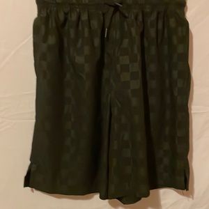 Black shorts with a drawstring waist.